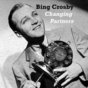 收聽Bing Crosby的Changing Partners歌詞歌曲