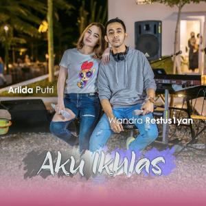 Dengarkan Aku Ikhlas lagu dari Wandra dengan lirik