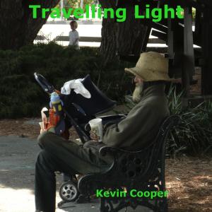 Dengarkan lagu Travelling Light nyanyian Kevin Cooper dengan lirik