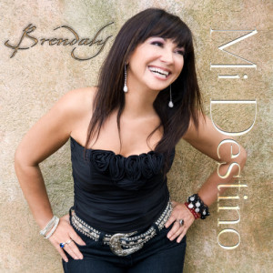 ดาวน์โหลดและฟังเพลง Sube Las Manos (feat. Miguel Angel) พร้อมเนื้อเพลงจาก Brendaly