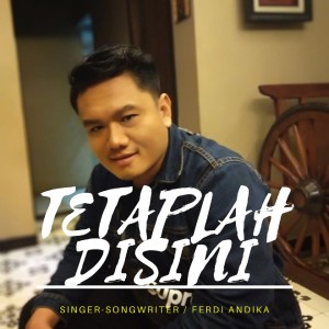 Dengarkan lagu Tetaplah Disini nyanyian Ferdi Andika dengan lirik