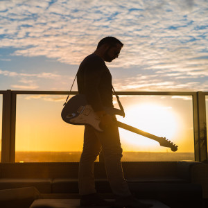 Listen to The Girl Next Door song with lyrics from Evan Troop