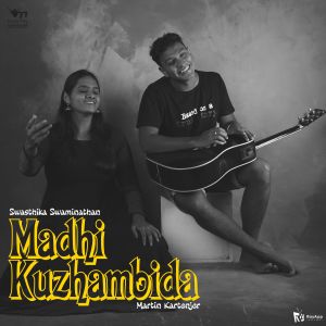 Dengarkan lagu Madhi Kuzhambida nyanyian Martin Kartenjer dengan lirik