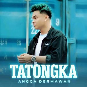 Dengarkan TATONGKA lagu dari ANGGA DERMAWAN dengan lirik