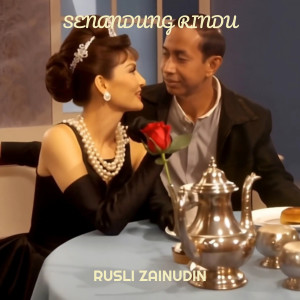 Listen to Senandung Rindu song with lyrics from Rusli Zainudin