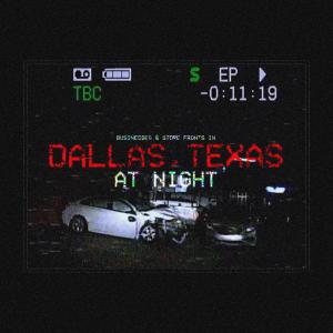 Album businesses and store fronts in Dallas TX at night from 