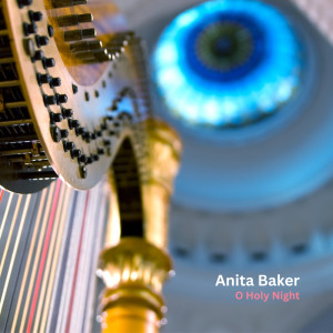 Listen to O Holy Night song with lyrics from Anita Baker