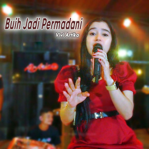 Dengarkan lagu Buih Jadi Permadani nyanyian Vivi Artika dengan lirik