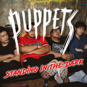 Listen to Standing in the Dark song with lyrics from Puppets