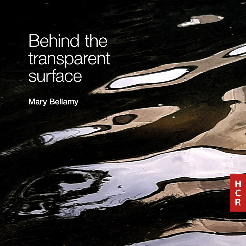 Behind the transparent surface