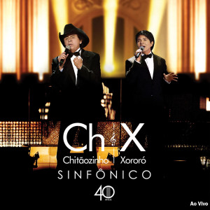 Listen to Sorrir (Smile) (Ao vivo) (Ao Vivo) song with lyrics from Chitãozinho & Xororó