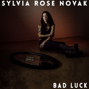 ดาวน์โหลดและฟังเพลง Bad Luck พร้อมเนื้อเพลงจาก Sylvia Rose Novak