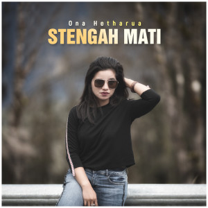 Listen to Stengah Mati song with lyrics from Ona Hetharua