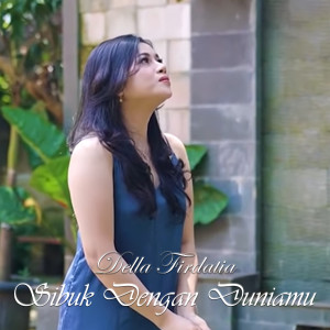 Listen to SIBUK DENGAN DUNIAMU song with lyrics from Della Firdatia