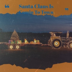 Dengarkan lagu Santa Claus Is Comin To Town nyanyian Conway Twitty dengan lirik
