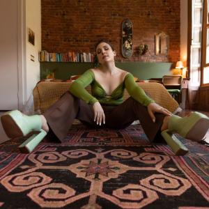 Listen to Under Your Spell song with lyrics from Olivia Castriota